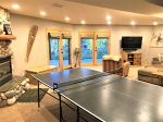 Lower level Family Room with TV, fireplace, Ping Pong Table